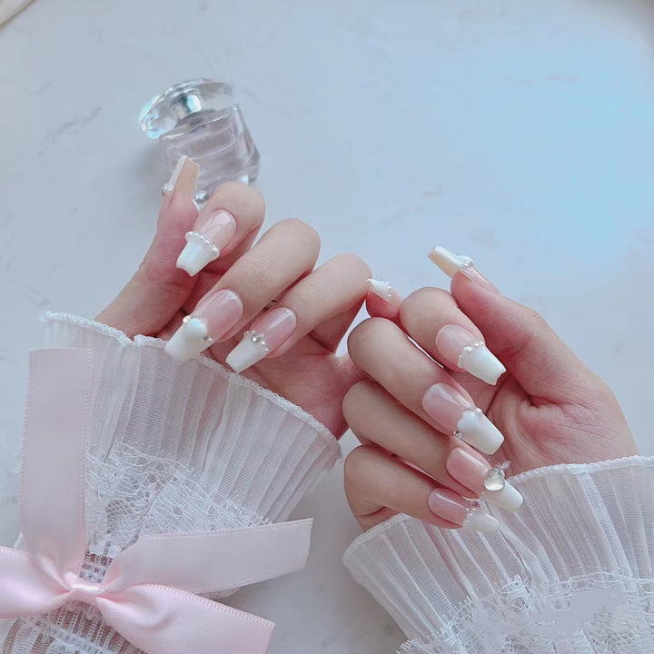 Artificial nails with elegant pearl accents
