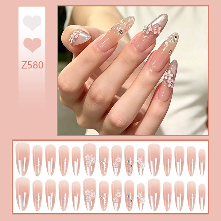 Nail art set with floral 3D applications and glitter accents Bowlift