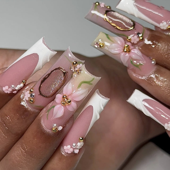 Artful nail extensions with floral embellishments Bowlift