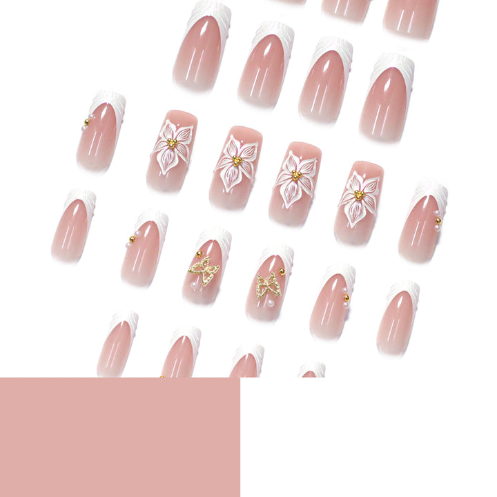 Elegant artificial nails with floral design and gold accents Bowlift