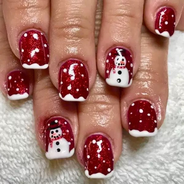 Artificial nail set with festive snowman motifs and glitter accents Bowlift