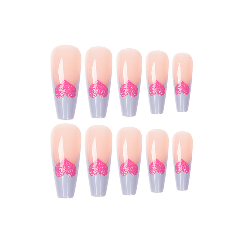 Artful stiletto nails with colorful heart designs Bowlift