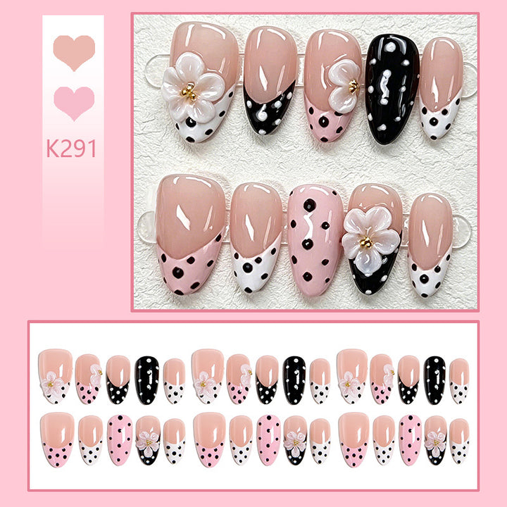 Nail art set with floral accents and elegant dots Bowlift