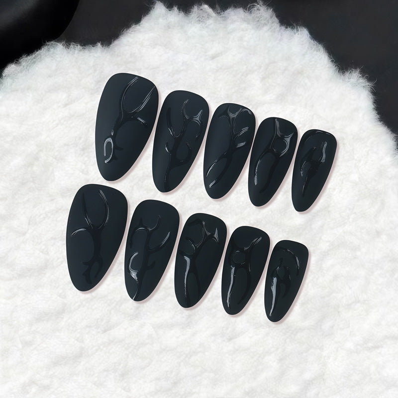 Artistic Stiletto Nail Design with Glossy Finish Bowlift