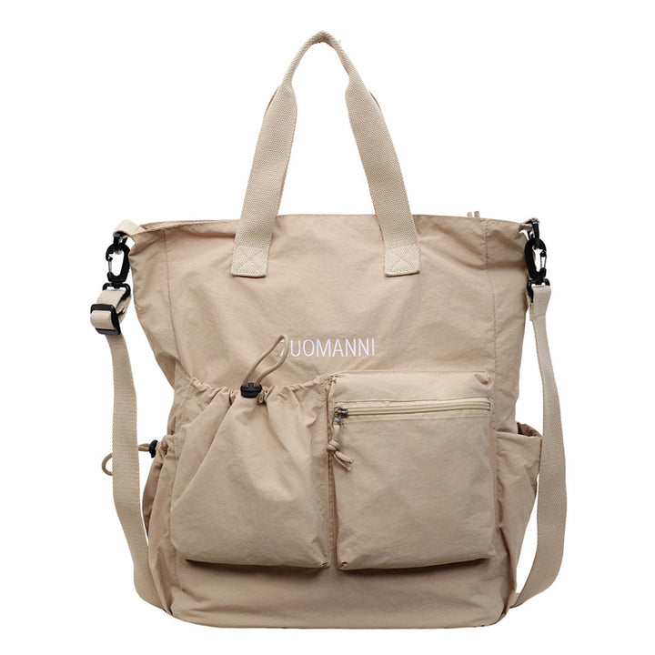 Tote bag with multifunctional outer pockets and adjustable shoulder strap Bowlift
