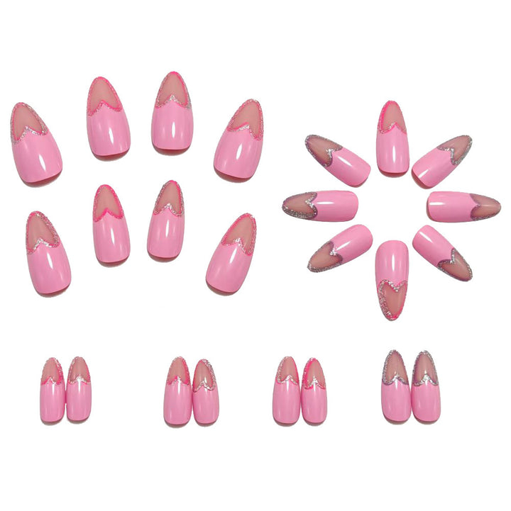 Art nails with heart design and glitter accents Bowlift