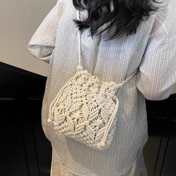 Hand-knotted shoulder bag with floral details Bowlift