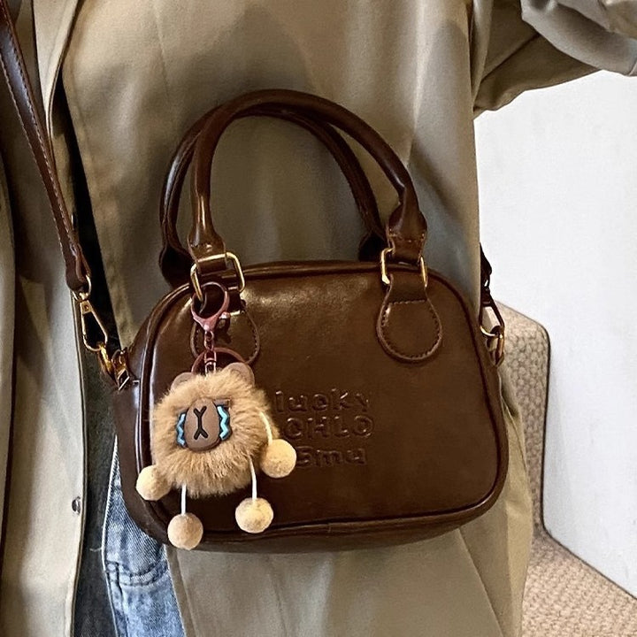 Vintage-Inspired Structured Handbag Bowlift