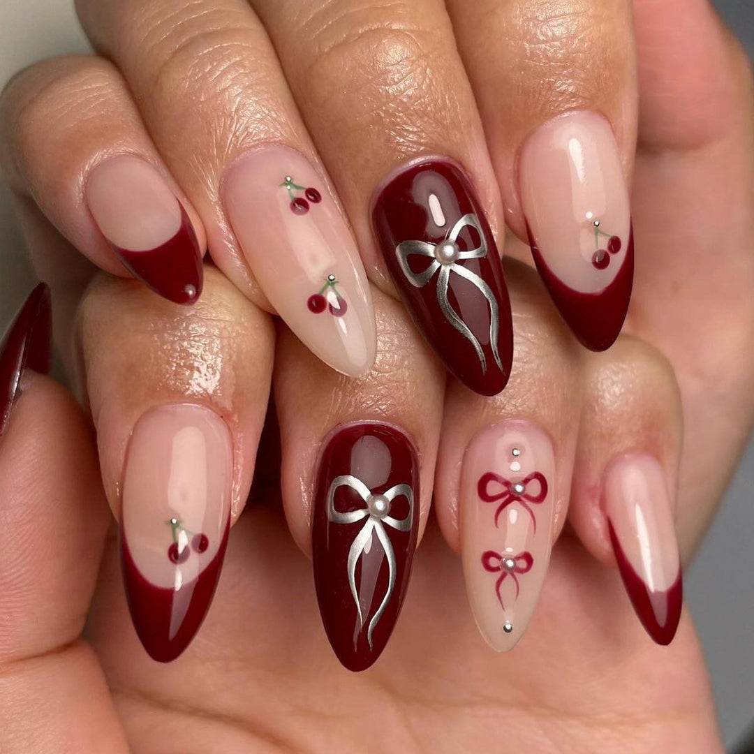 Glamorous stiletto nails with delicate accents Bowlift