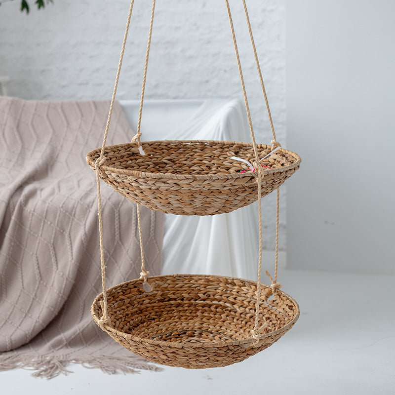 Hanging chair made of braided natural material with comfortable cushions Bowlift