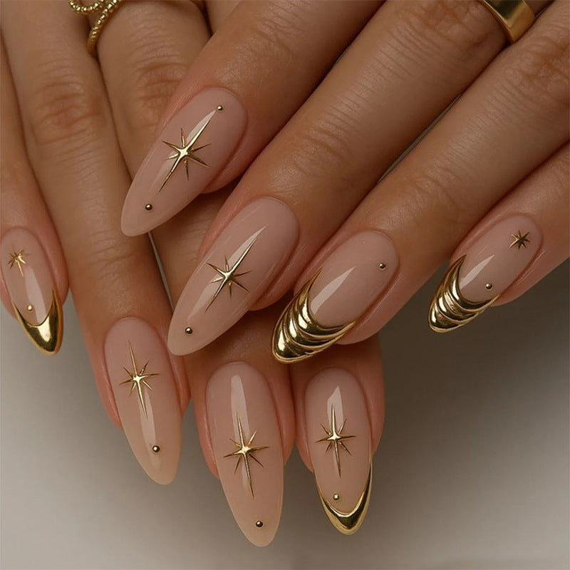 Artificial nail set with elegant golden accents and sparkling stars Bowlift