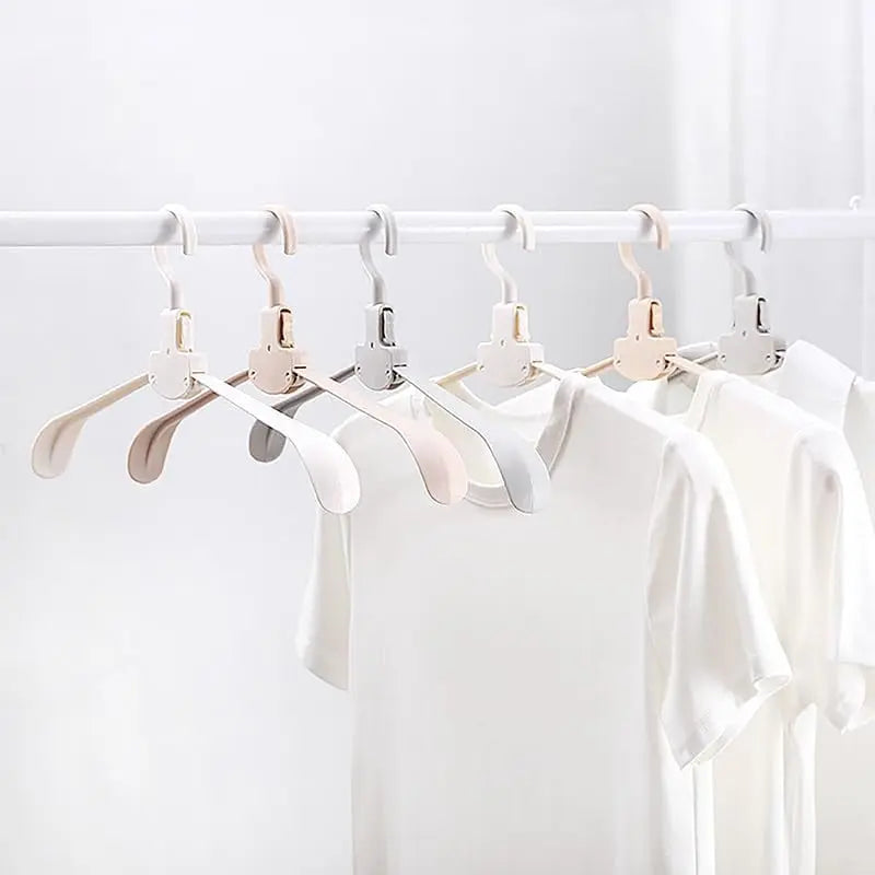 BowLift | Robust foldable clothes hanger with one-button function and crease pRedection