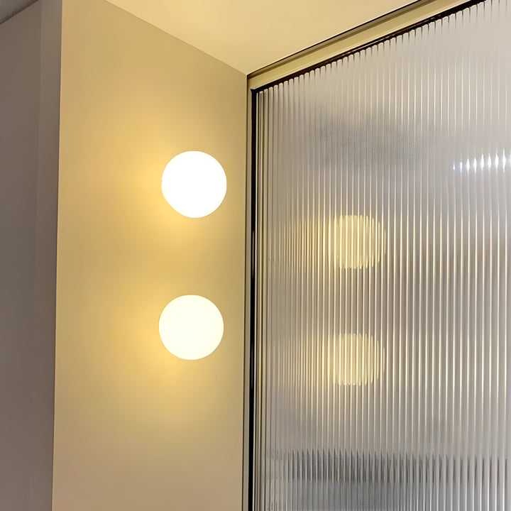 GlasAura Wall Lamp with Matte Glass Ball and Metal Base | Bowlift