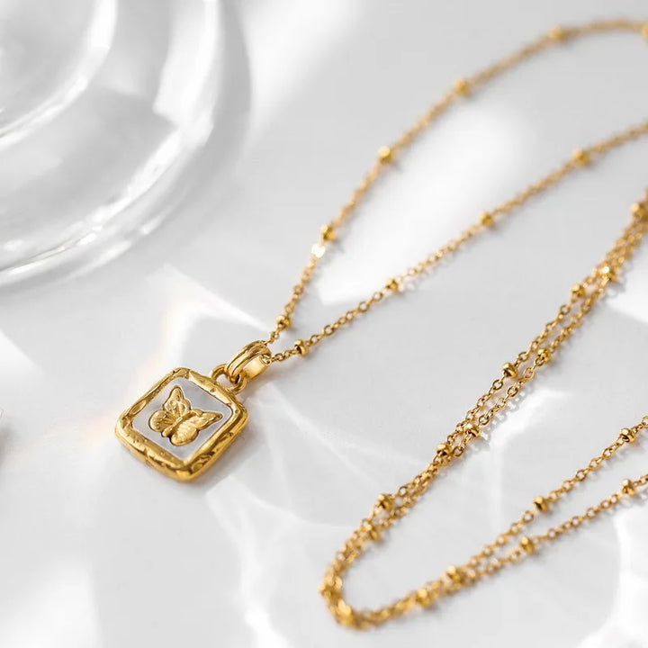 BowLift | Feminine Gold Accented Butterfly Square Pendant Necklace