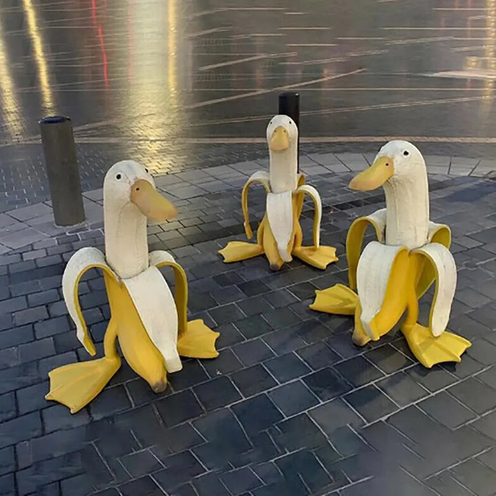 BowLift | BananaDuck Sculpture "Quaki" | Funny Garden Decor | Weatherproof Resin | 17 cm