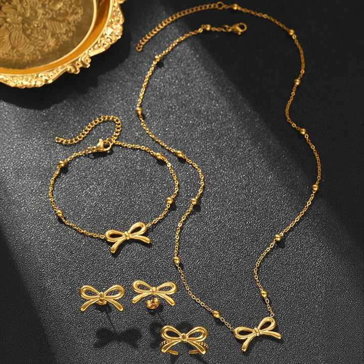 BowLift | Feminine Bow Satellite Chain Necklace, Bracelet, Earrings, and Ring Set