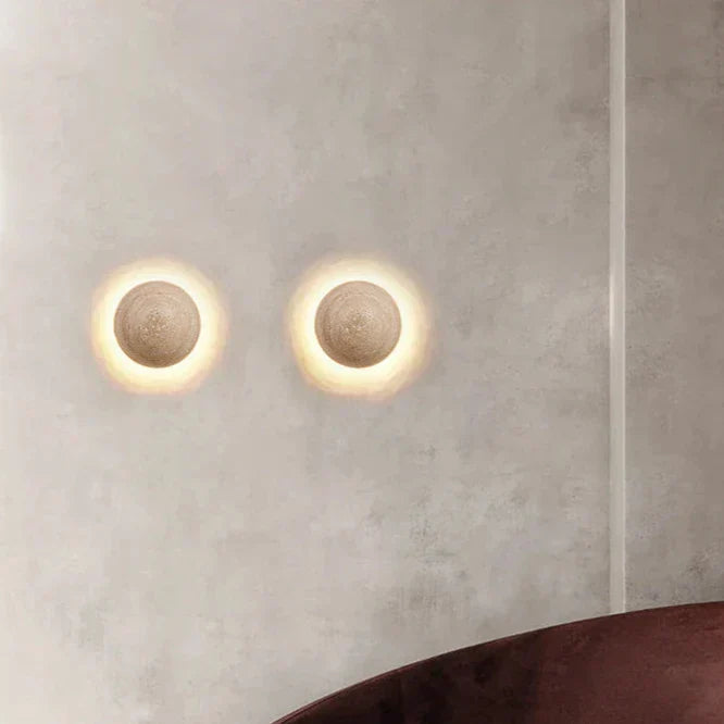 BowLift | Cream wall lamp in Scandinavian style providing cozy light and elegant simplicity