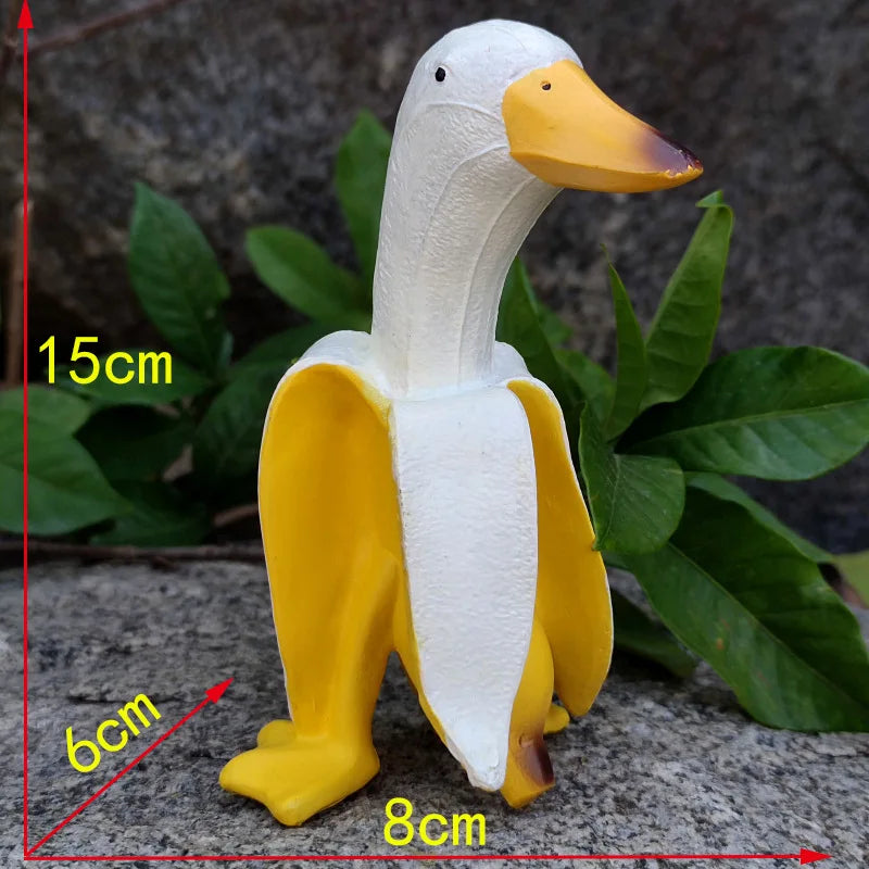 BowLift | BananaDuck Sculpture "Quaki" | Funny Garden Decor | Weatherproof Resin | 17 cm