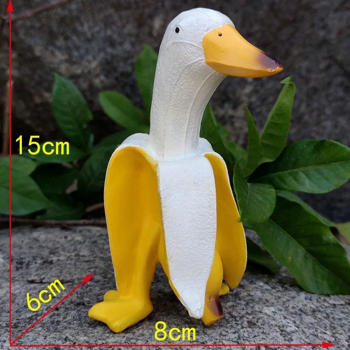 BowLift | BananaDuck Sculpture "Quaki" | Funny Garden Decor | Weatherproof Resin | 17 cm