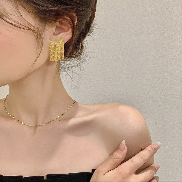 BowLift | Golden Shining City Tassel Earring