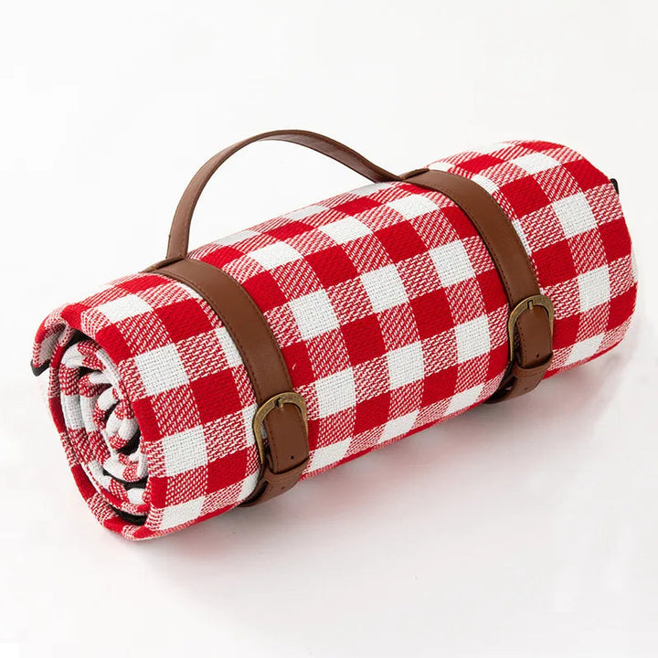 Waterproof picnic blanket with leather carrying strap | Bowlift