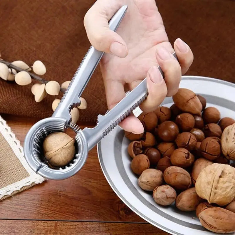 BowLift | Nutoro Nutcracker made of metal | Multifunctional for walnuts, chestnuts, almonds & hazelnuts | Ergonomic handle | Silver