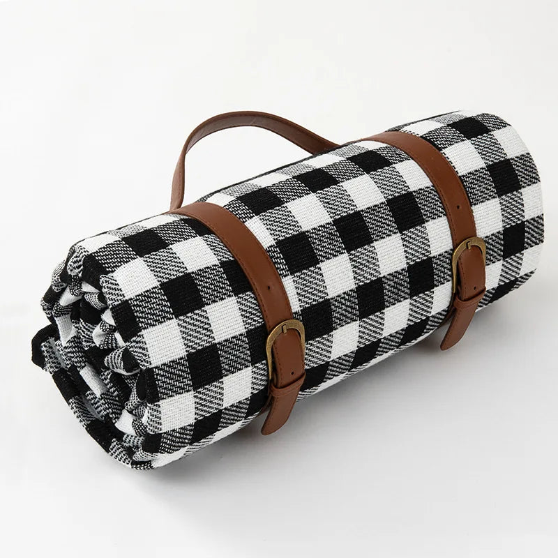 Waterproof picnic blanket with leather carrying strap | Bowlift