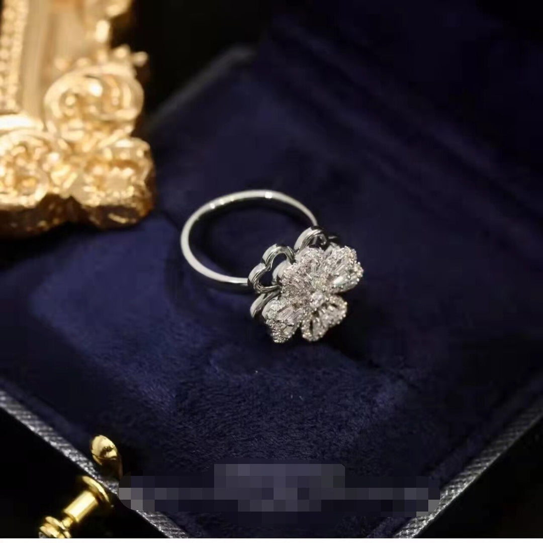 BowLift | Rotating Flower Zircon Clover Ring
