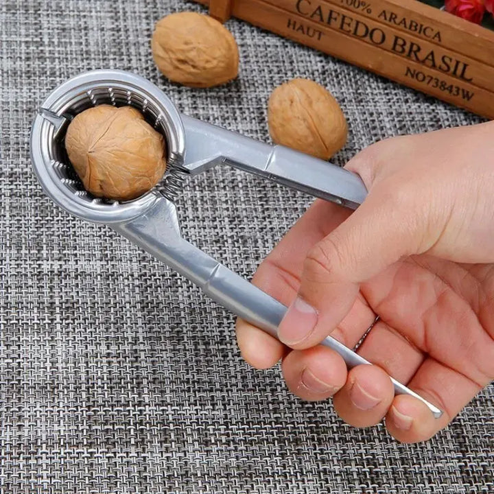 BowLift | Nutoro Nutcracker made of metal | Multifunctional for walnuts, chestnuts, almonds & hazelnuts | Ergonomic handle | Silver