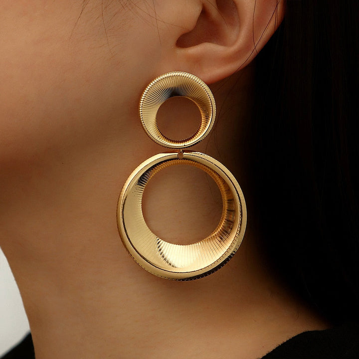 Golden Circle Earrings | Unique Statement Jewelry for a Bold Look Bowlift