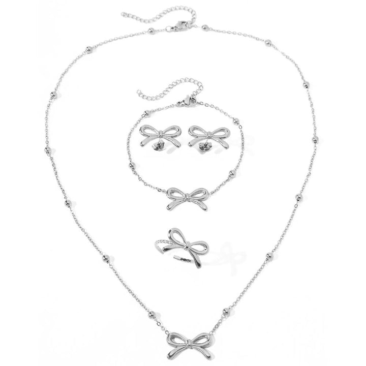 BowLift | Feminine Bow Satellite Chain Necklace, Bracelet, Earrings, and Ring Set