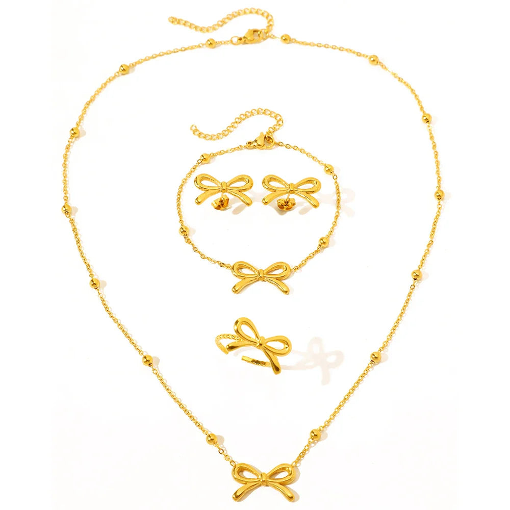 BowLift | Feminine Bow Satellite Chain Necklace, Bracelet, Earrings, and Ring Set