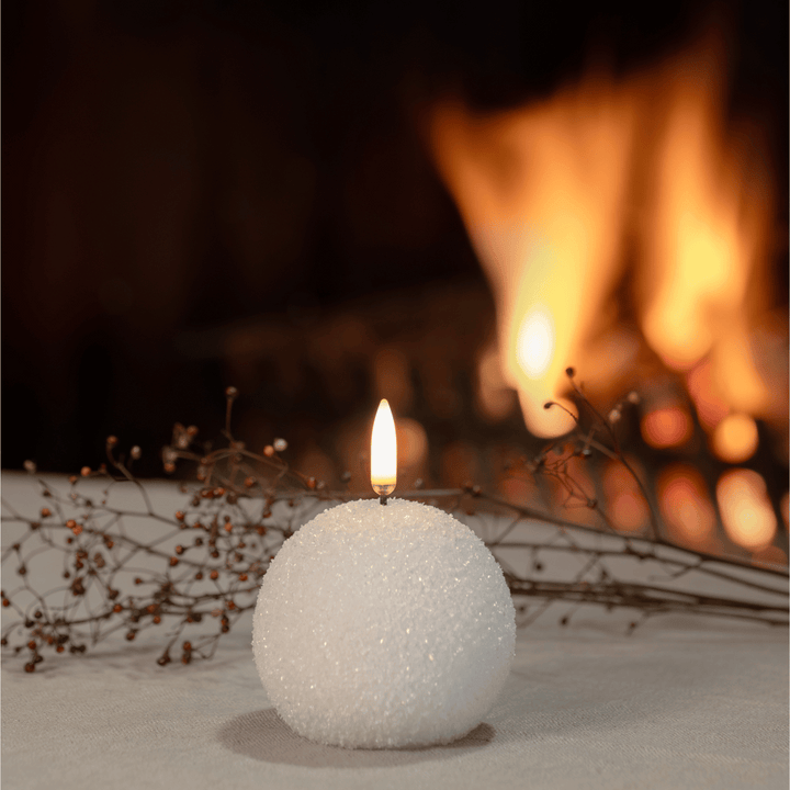 BowLift | WinterShine – Elegant LED Candle in Snow Globe Design