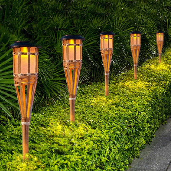 Solar-powered garden torches in bamboo design – Weatherproof LED decorative lighting for outdoors | Bowlift