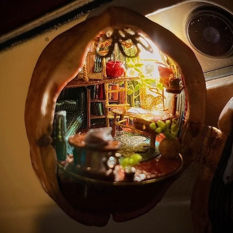 BowLift | Handcrafted dollhouse made from walnut shells with interior light