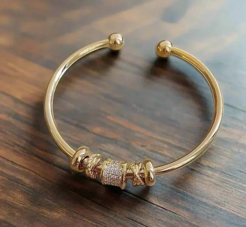 BowLift | Adjustable bracelet with golden charms