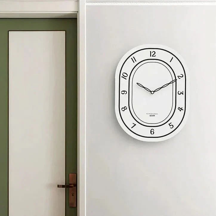 BowLift | Silent Oval Wall Clock with Roman Numerals Design