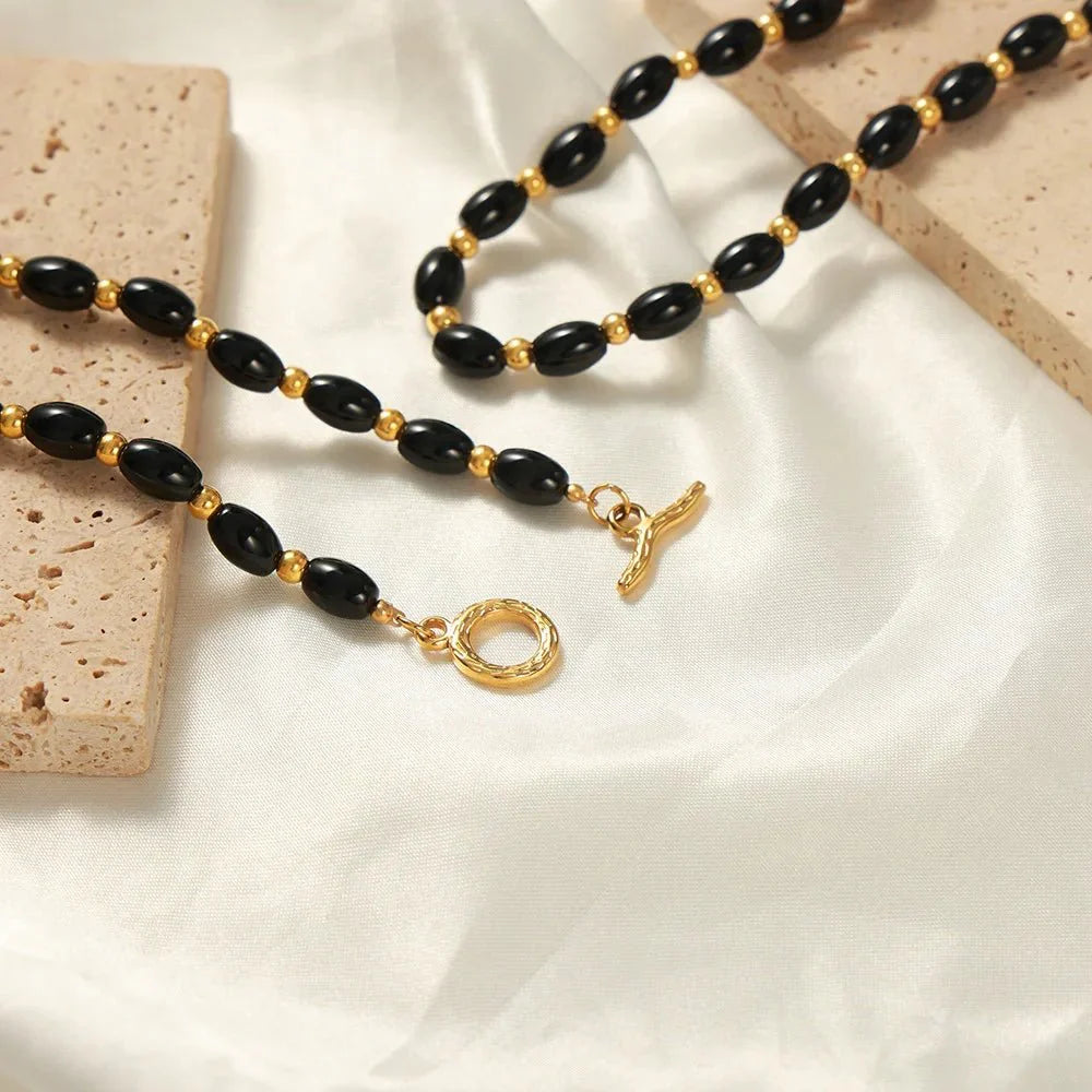 BowLift | Boho Beaded Black and Gold Circle Clasp Necklace