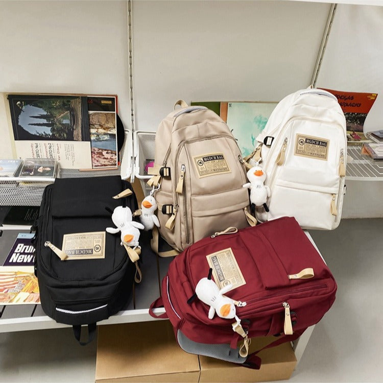 Double-shoulder backpack for students and pupils
