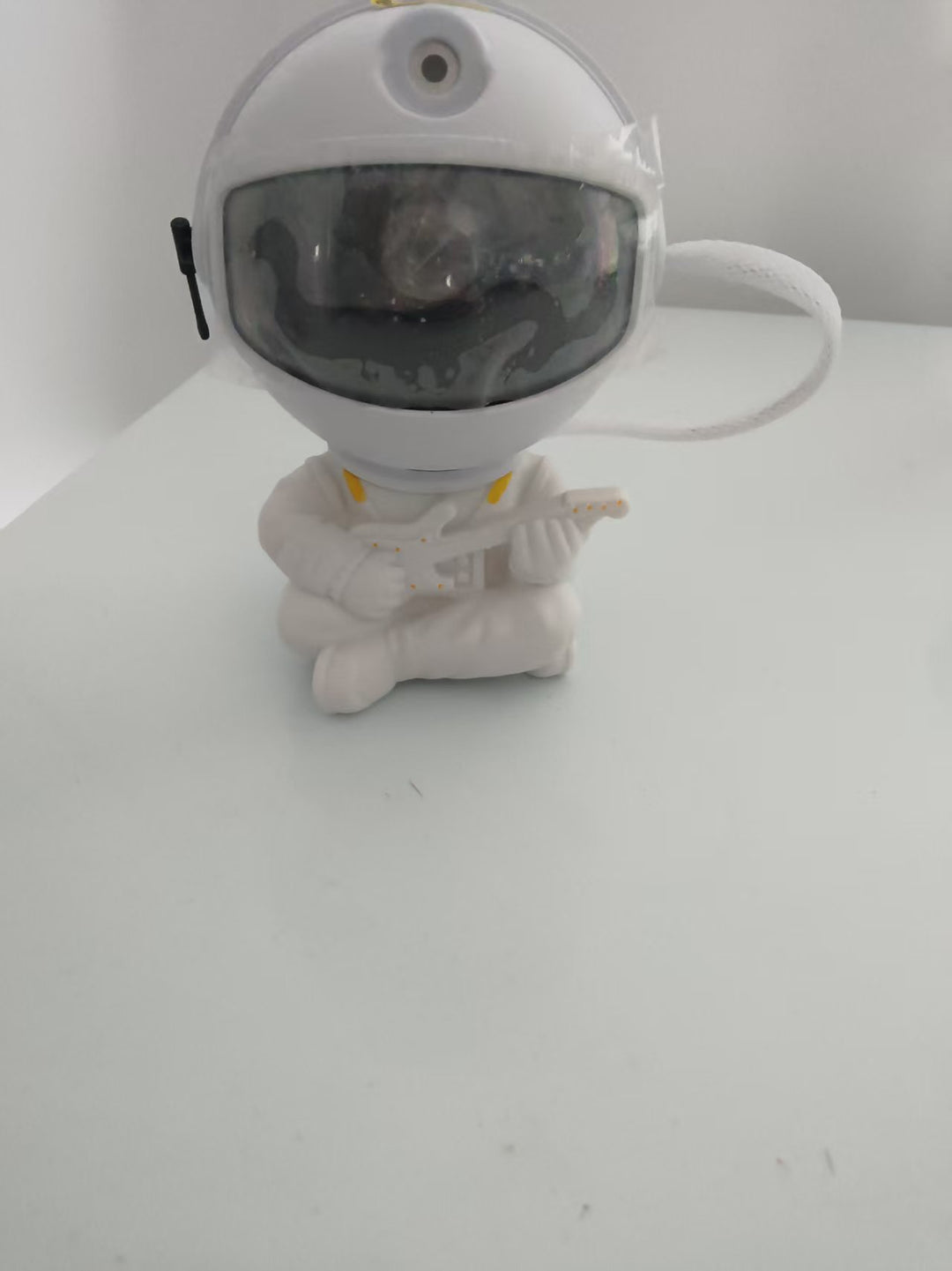 Star projector with astronaut and starry sky