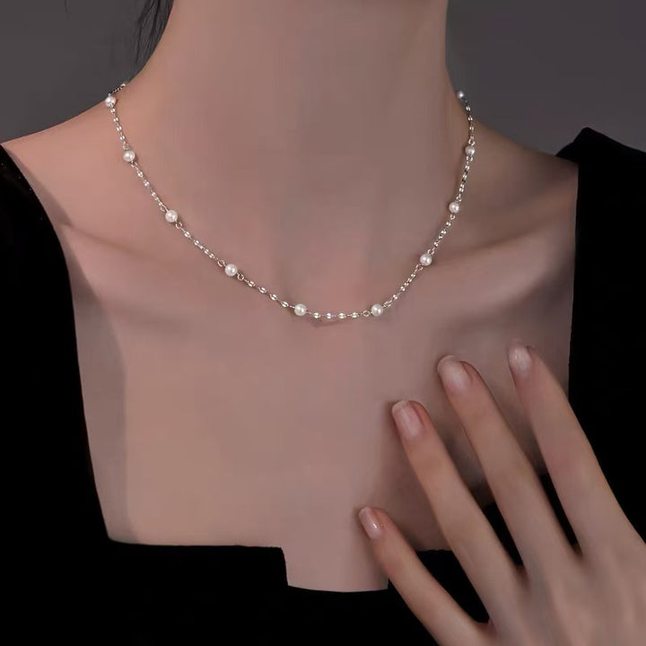 Pearl necklace with silver clasp, pearls 4–12 mm