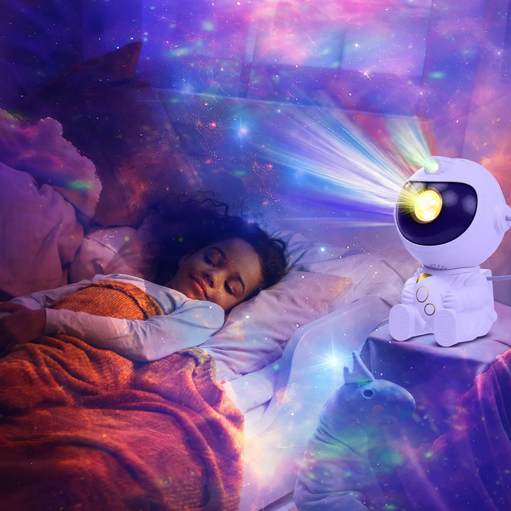 Star projector with astronaut and starry sky