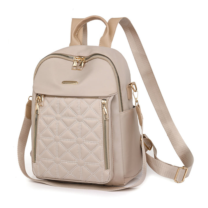 Backpack with diamond quilting, water-repellent