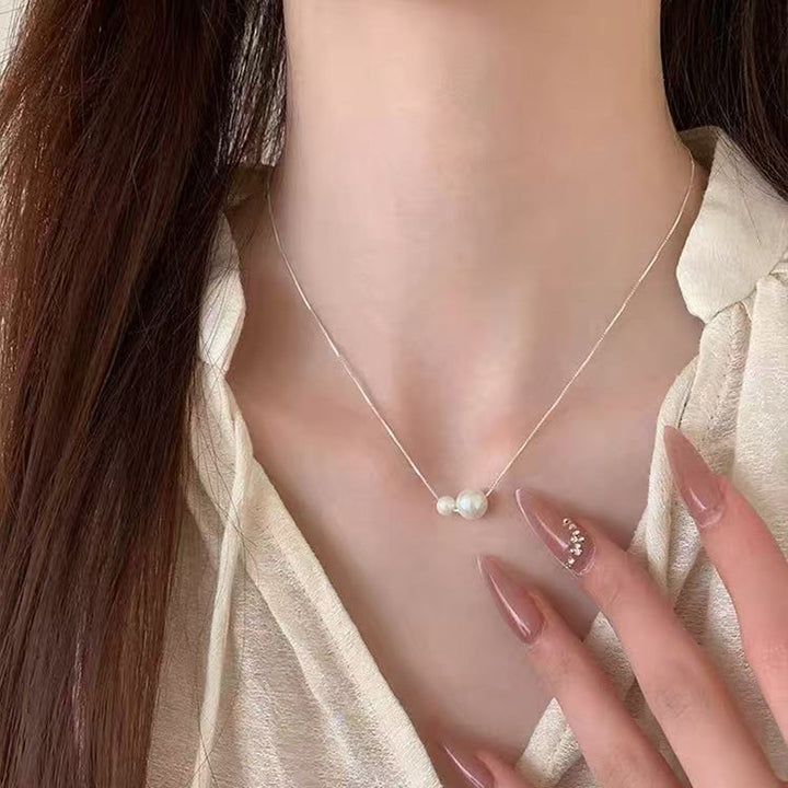 Pearl necklace with silver clasp, pearls 4–12 mm