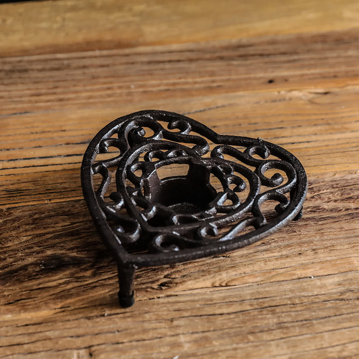Cast iron tea warmer with burner stand
