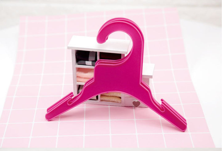 Plastic hanger for pet clothing