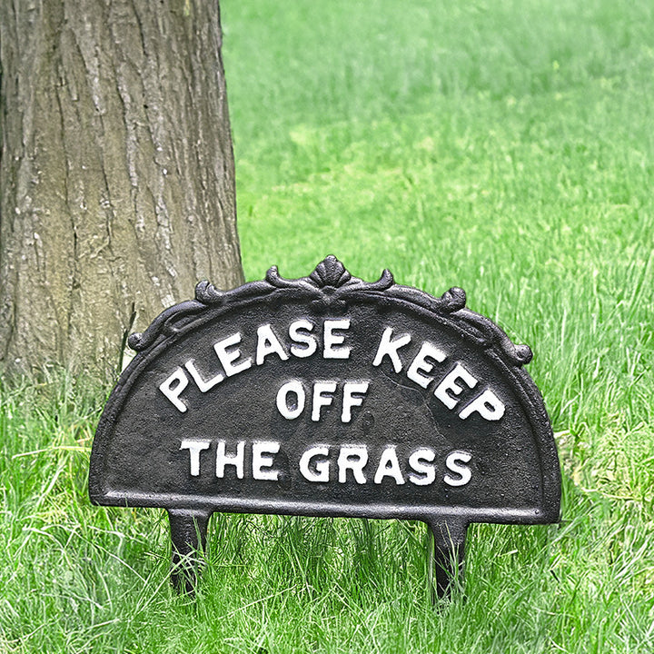 Cast iron garden plaque with dog motif