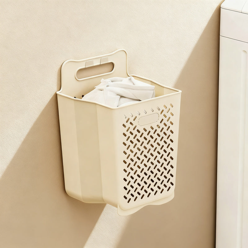 Foldable laundry basket for wall mounting