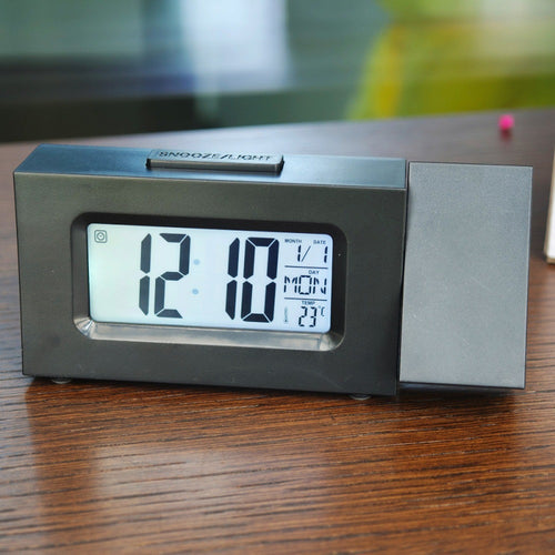 Mini projection clock with LCD display