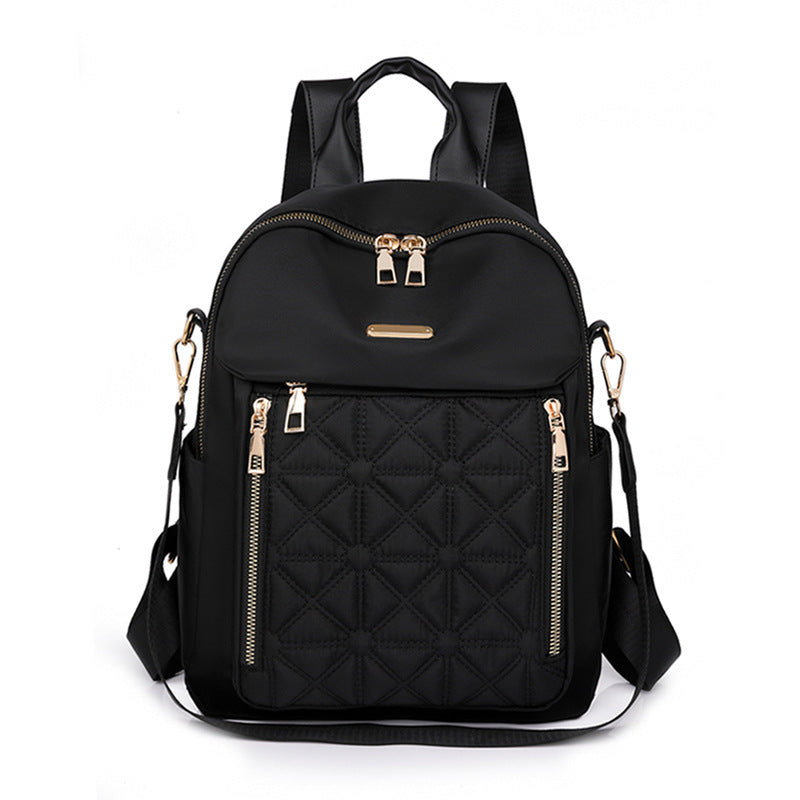 Backpack with diamond quilting, water-repellent